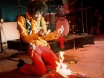 401 jimi hendrix with his burning guitare in MONTEREY POP